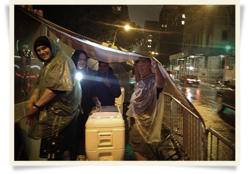 17th Street BBQ Pit Crew takes cover from the rain at the Big Apple Barbecue Block Party